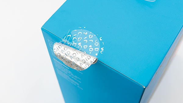 Sicherheits-Siegel auf blauem Karton, Void, rund, transparent und silber