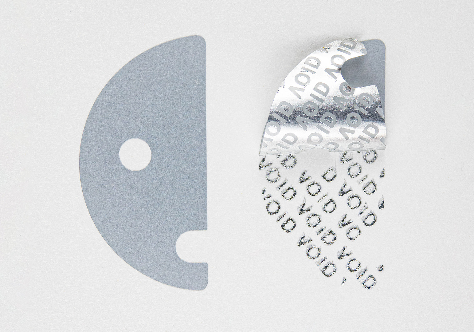 Sonderformat Void-Etikett mit Sicherheitsstanzung