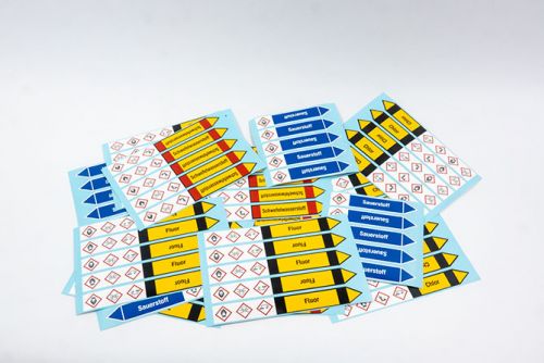 Rohrleitungskennzeichnungen auf Bogen von Unipress