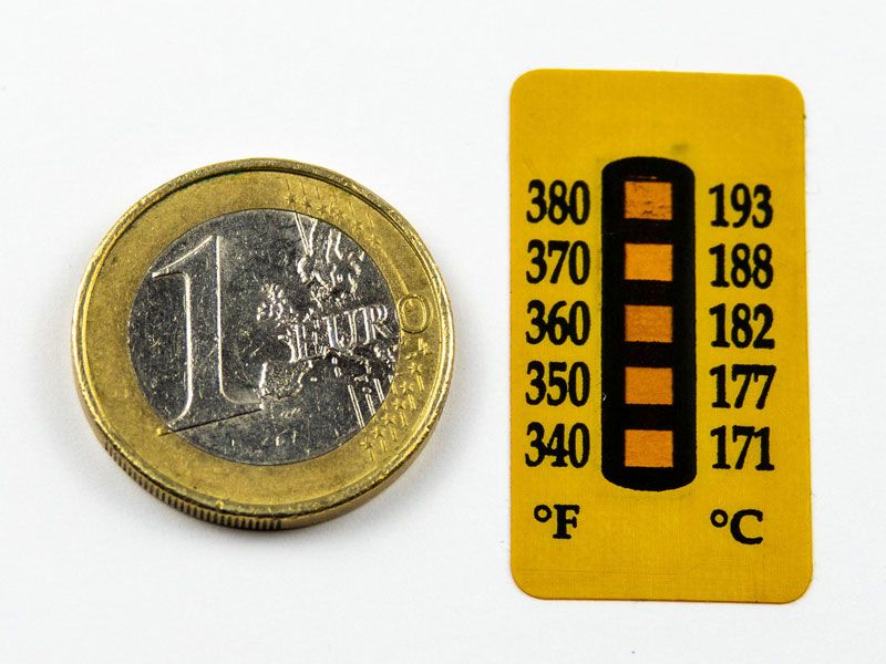 Temperaturmessstreifen irreversibel, gelb, Farenheit und Grad Celsius, Vergleich Euromünze